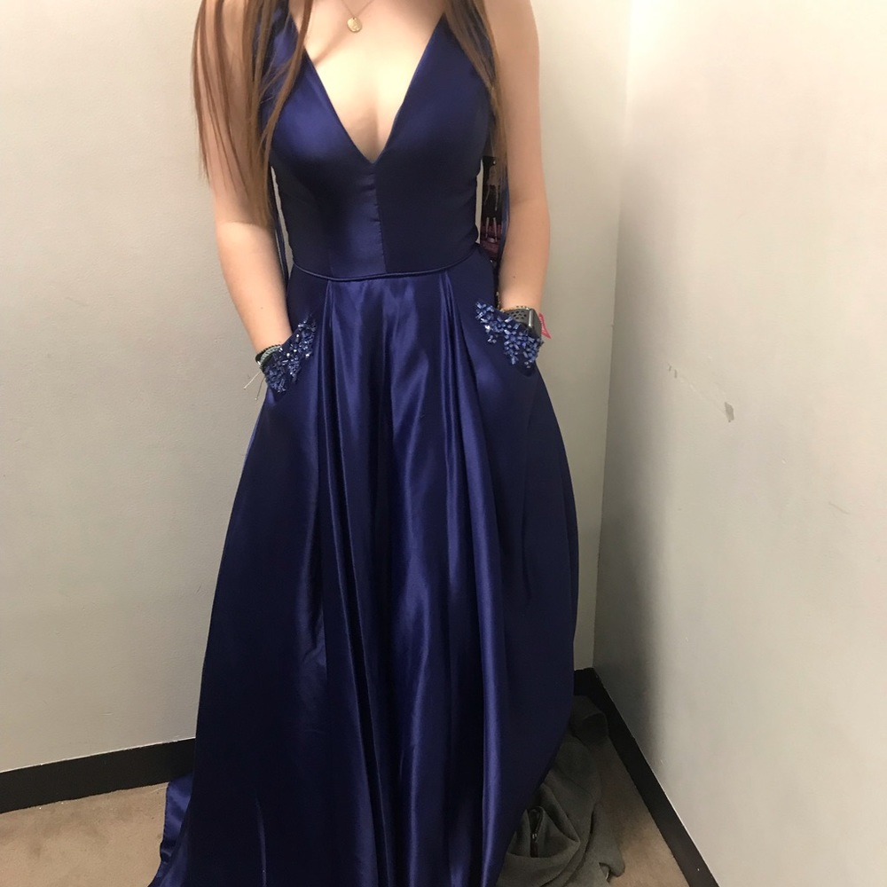 royal blue prom dress with plunging neckline
